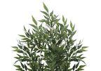 Close-up of the lush green, pointed leaves and thin branches of a large faux acacia tree against a white background.