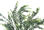 Close-up of an artificial eucalyptus plant with numerous small, round, sage-green leaves on thin dark stems.