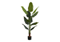 A tall artificial Bird of Paradise plant with large, sculptural green leaves in a simple black pot.