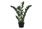Artificial medium ZZ plant with dark green, structured leaves in a simple black pot against a white background.