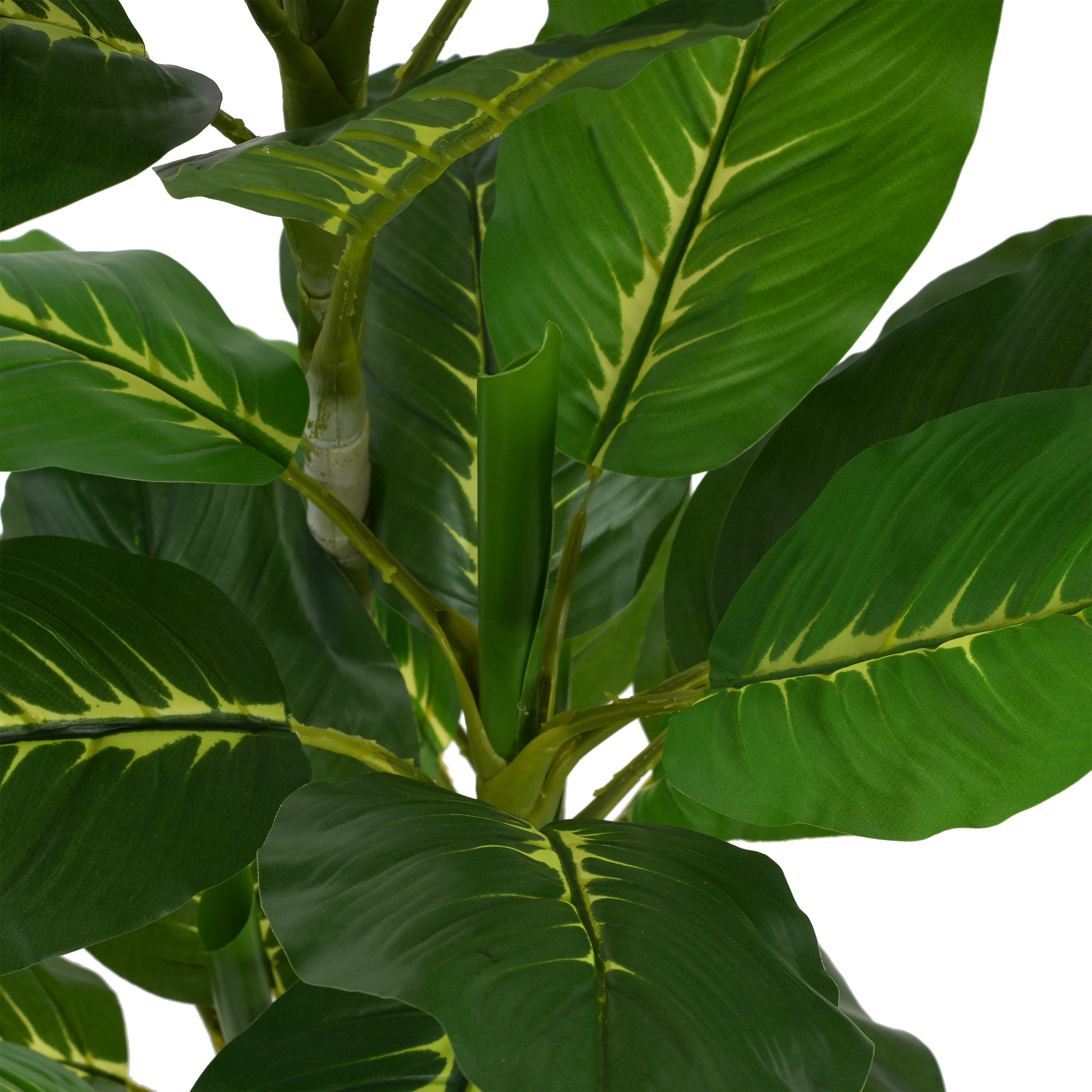 Close-up of the broad, green, and yellow patterned leaves of an artificial Dieffenbachia plant.