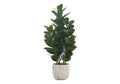 A medium-sized artificial Garcinia bush with dense, dark green leaves in a white and gold marbled planter.