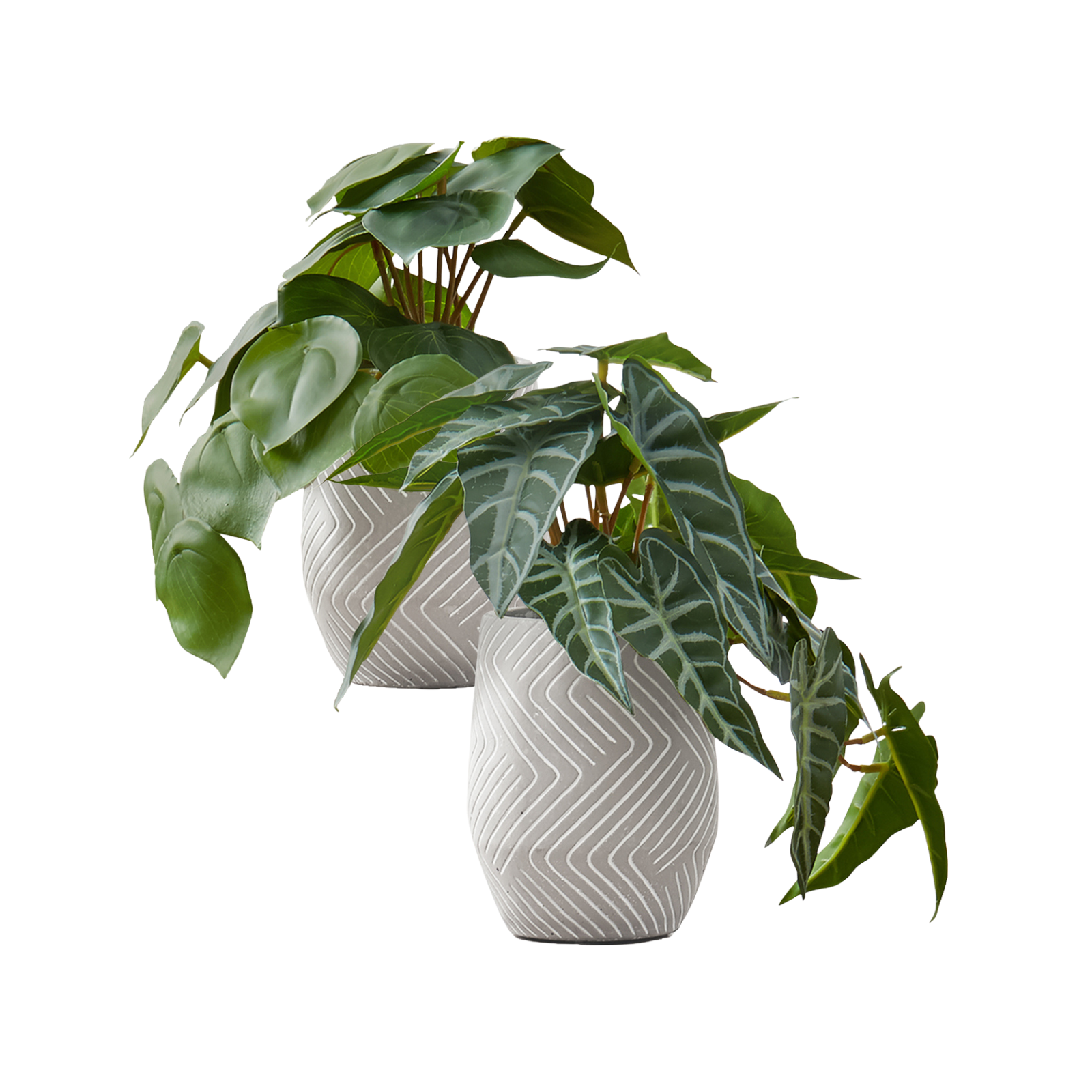 Two artificial plants in textured grey pots with white geometric patterns, featuring broad and arrow-shaped leaves.