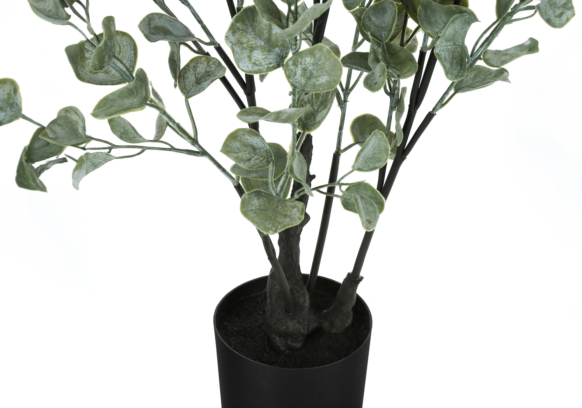 Close-up of an artificial eucalyptus plant with frosted green leaves in a simple black pot against a white background.