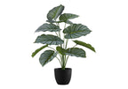 A medium-sized artificial Calathea Orbifolia plant with broad, striped green leaves in a simple black pot.
