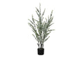 Tall artificial eucalyptus plant with slender stems and small green leaves in a simple black pot against white.