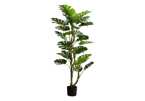 Tall artificial Monstera tree with dual trunks and large, split green leaves in a simple black pot.